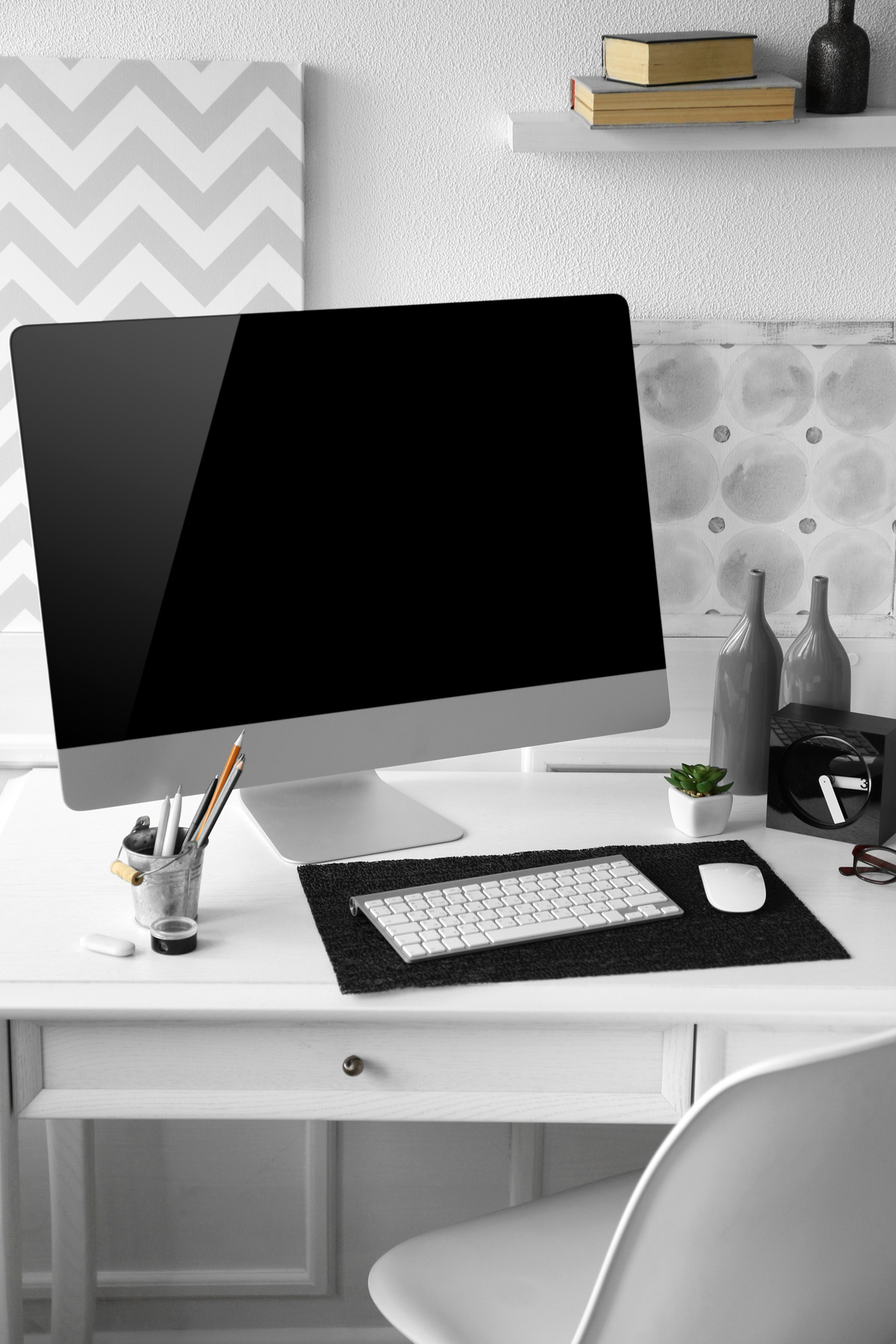 Modern Wide Screen Monitor on White Table in Room Interior